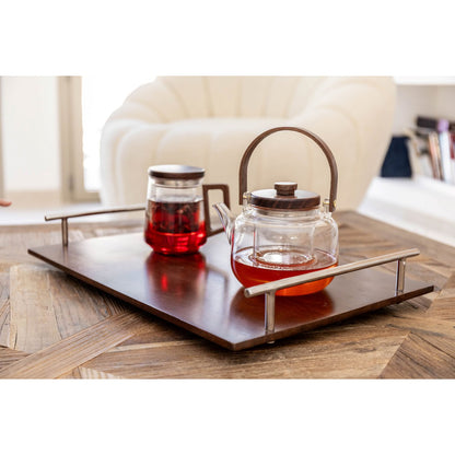 Glazen theepot met houten handgreep